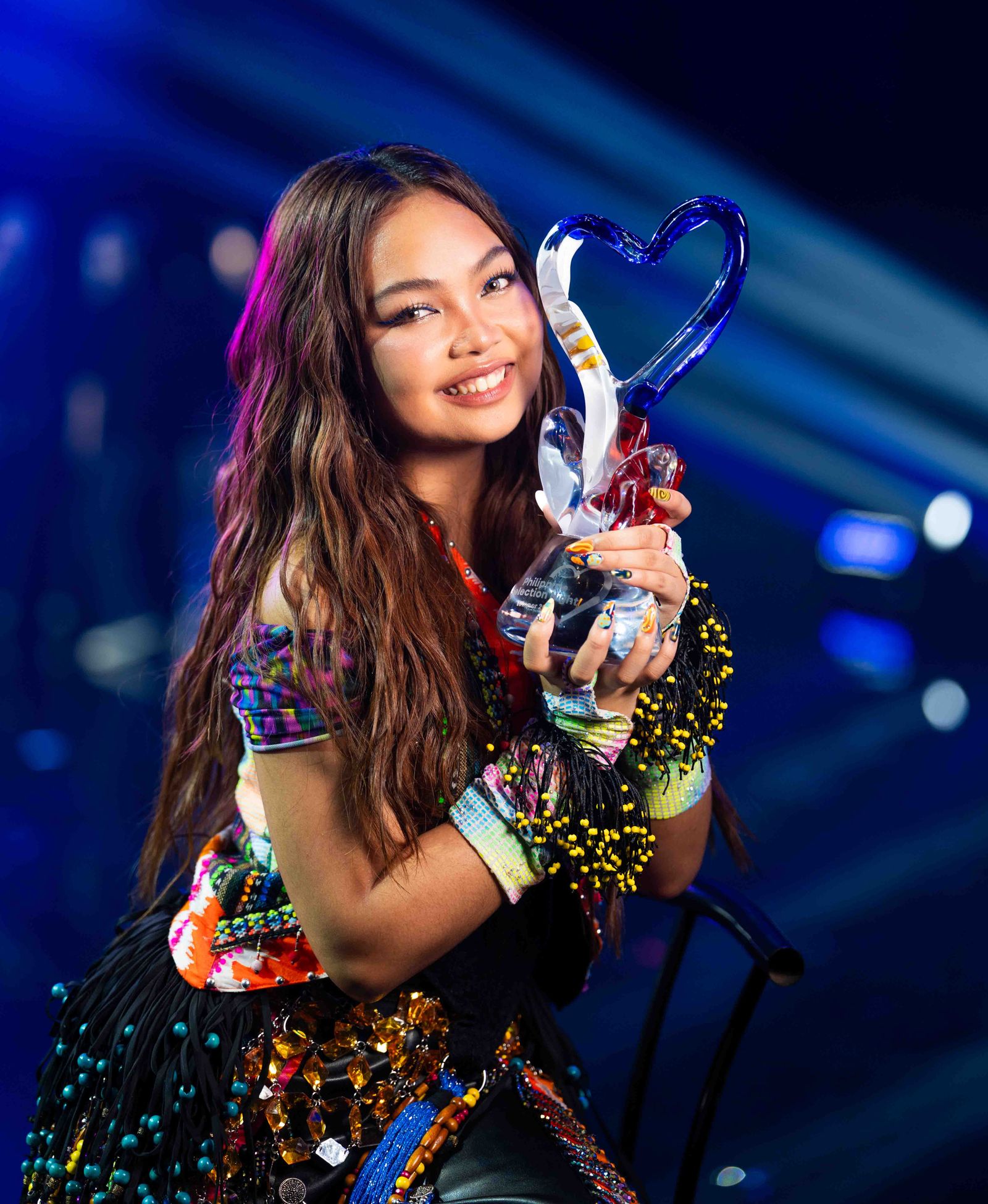 CARMELLE lifts the Philippine Selection Night trophy
